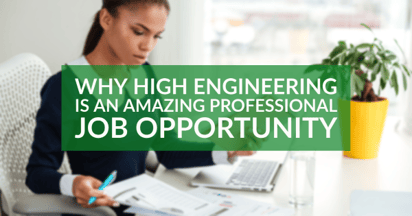 A young woman working at a desk with a plant